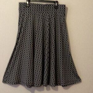 Black & white short flared pull on skirt Medium.